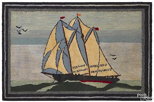 American hooked rug of a schooner, early 20th c.