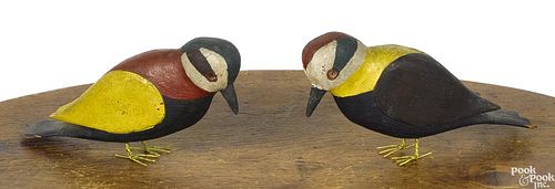 Pair of carved and painted song birds