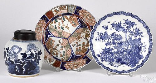 Two Imari chargers, together with a ginger jar