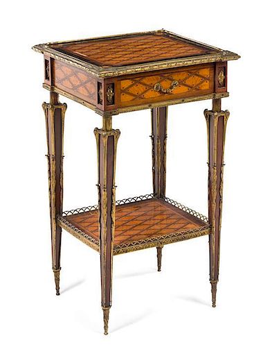 * A Louis XVI/Napoleon III Style Gilt Metal Mounted Parquetry Table Height 27 3/4 x width 16 1/2 x depth 14 1/2 inches.