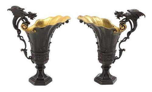 * A Pair of French Bronze Ewers Height 8 1/2 inches.