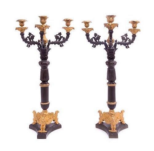 A Pair of Empire Style Gilt and Patinated Bronze Four-Light Candelabra Height 22 inches.