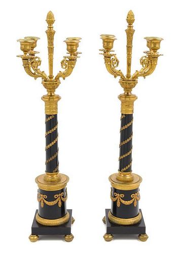 A Pair of Empire Style Gilt Bronze Mounted Four-Light Candelabra Height 22 inches.
