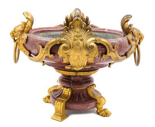 A Neoclassical Gilt Bronze Mounted Rouge Marble Jardiniere Width 21 3/4 inches.