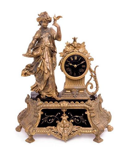* A French Cast Metal and Slate Figural Mantel Clock Height 17 1/2 inches.