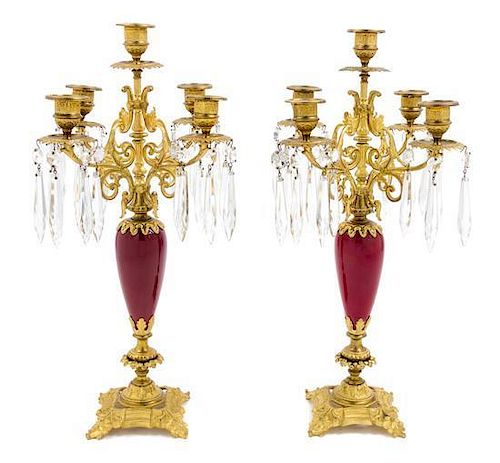 * A Pair of French Gilt Bronze and Sang de Boeuf Porcelain Five-Light Candelabra Height 17 1/2 inches.