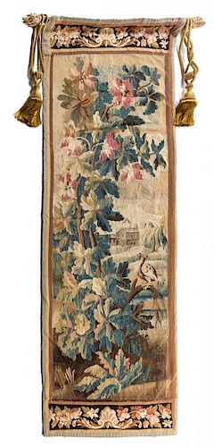 A Flemish Wool Tapestry Fragment 8 feet 2 inches x 2 feet 9 inches.