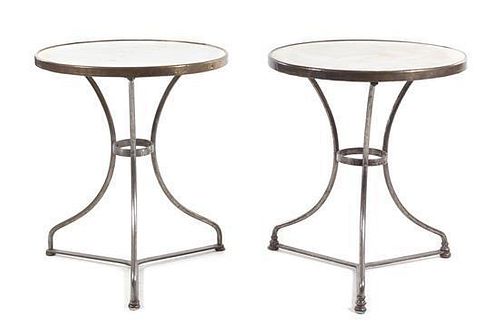 A Pair of Neoclassical Style Steel Gueridons Height 27 x diameter of top 23 1/2 inches.