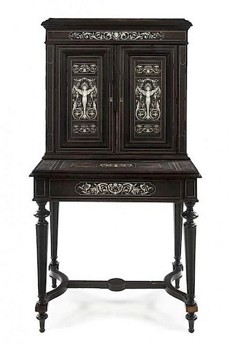 An Italian Inlaid Ebonized Cabinet on Stand Height 56 1/8 x width 29 7/8 x depth 20 5/8 inches.