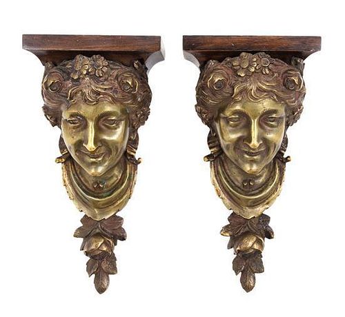 * A Pair of Continental Bronze Wall Brackets Height 12 inches.