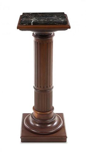 * A Mahogany and Marble Pedestal Height 35 5/8 inches.