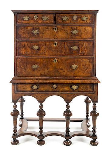 A William and Mary Walnut Chest on Stand Height 59 3/4 x width 38 x depth 21 1/2 inches.