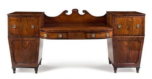 A Regency Mahogany Sideboard Height 46 x width 102 1/2 x depth 24 inches.