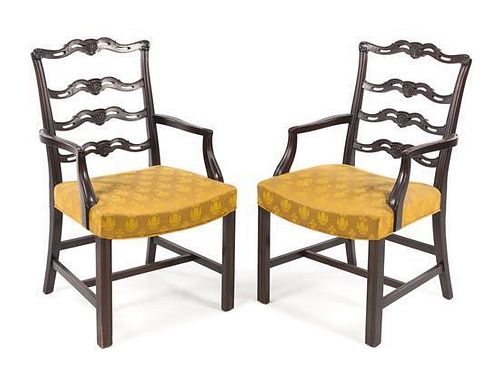 A Pair of Chippendale Style Mahogany Open Armchairs Height 38 1/2 x width 21 1/2 x depth 22 inches.