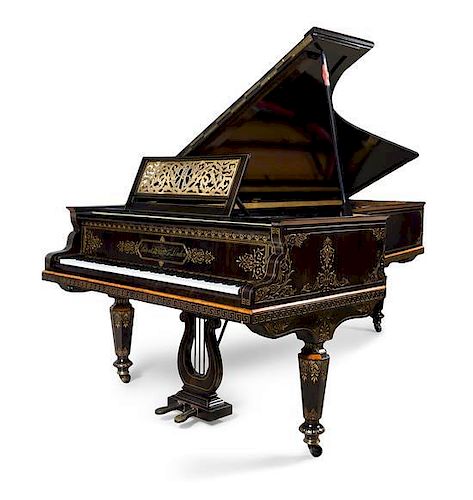A Victorian Calamander Concert Grand Piano Length of case 100 1/2 inches.