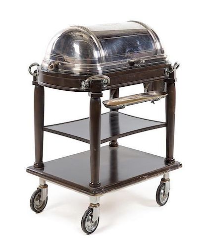 A Silver-Plate Roast Cart, 20th Century, the barrel top opening to a warming tray fitted with two sauce containers and a carv