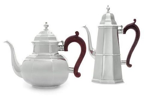 An English Silver Teapot and Coffee Pot, Likely Joseph Rodgers & Sons, London, 1977, in the Georgian taste, each of paneled f
