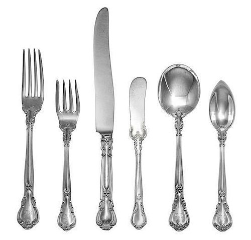 An American Silver Flatware Service, Gorham Mfg. Co., Providence, RI, Chantilly pattern, comprising: 12 luncheon knives 9 lun