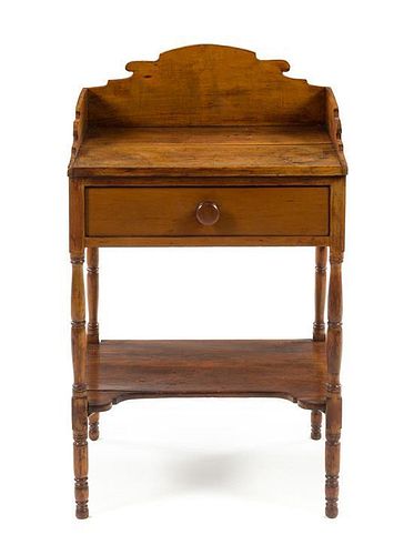 An American Maple Washstand Height 27 1/2 x width 22 3/4 x depth 18 inches.