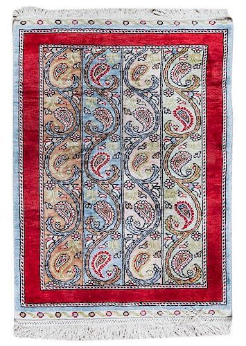 A Persian Silk Prayer Rug 2 feet 3 inches x 1 foot 7 1/4 inches.