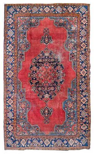 A Tabriz Wool Rug 10 feet x 7 feet 1 inch.