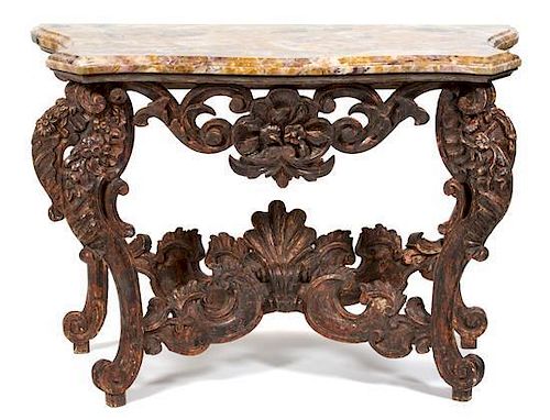 An Italian Rococo Style Silver Gilt Console Table Height 35 1/2 x width 52 x depth 26 inches.