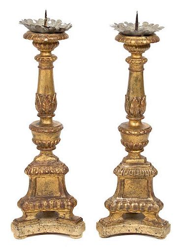 A Pair of Italian Parcel Giltwood Torcheres Height 25 inches.