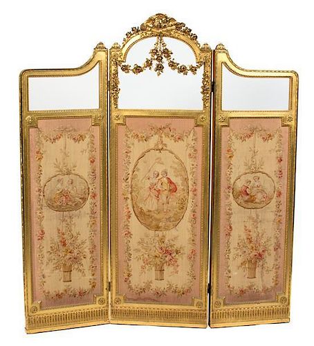 A Louis XVI Style Carved Giltwood Three-Panel Dressing Screen Height 69 1/2 x 18 inches each panel.
