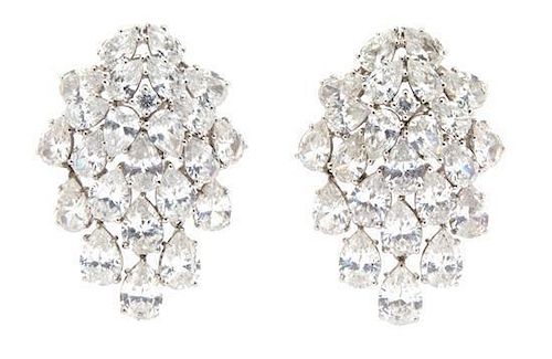A Pair of Silvertone and Pear-Shape Cubic Zirconia Cluster Earrings with Pendant Drops Length 1 3/4 inches.