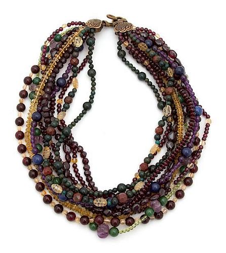 A Stephen Dweck Multi Strand Carved Multicolor Bead Necklace Length of longest 17 1/2 inches.
