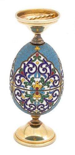 A Russian Silver Gilt and Enamel Wedding Cup, Late 19th/Early 20th Century, having an enameled egg splitting to form two foot