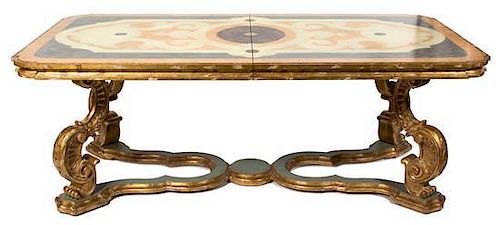 An Italian Rococo Style Dining Table Height 31 x width 84 x depth 46 inches (without leaves).