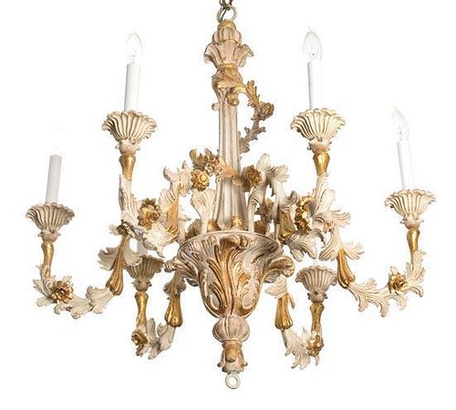 A Louis XV Style Carved Parcel Gilt Six-Light Chandelier Height 27 x diameter 27 inches.