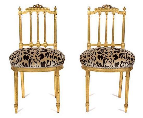 A Pair of Louis XVI Style Carved Giltwood Ballroom Chairs Height 32 1/4 inches.
