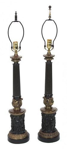 A Pair of Neoclassical Style Ebonzied and Gilt Bronze Columnar Table Lamps Height 36 3/4 inches.
