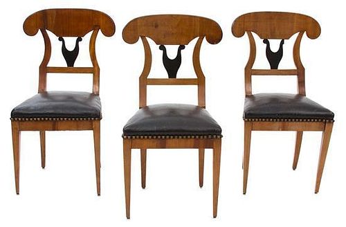 Three Beidemeier Walnut and Ebonized Side Chairs Height 36 inches.