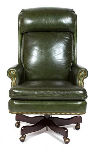 A Georgian Style Leather Upholstered Executive Desk Chair Height 48 inches.