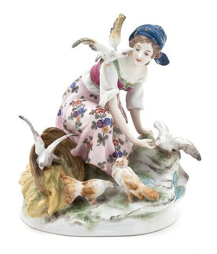 A Continental Porcelain Figure Height 7 3/4 inches.