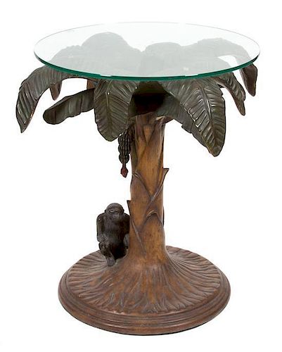A Palm Tree-Form Composite and Glass Top Table Height 29 inches, diameter of base 27 inches.