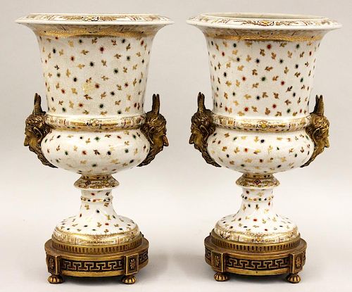 LARGE PAIR OF CONTINENTAL PORCELAIN AND ORMOLU URNS