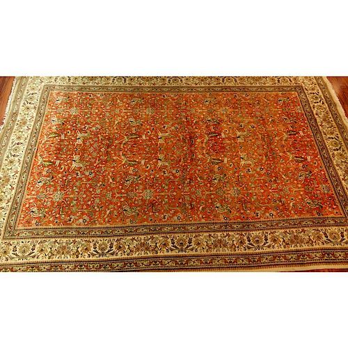 Large Semi Antique Karastan Persian Rug. Floral motif with hunting scenes.