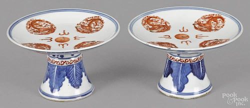 Pair of Chinese Qing dynasty porcelain stem bowls, 3 1/4'' h., 5 1/2'' w.
