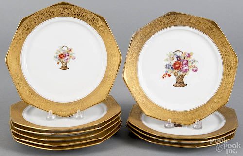 Set of ten Krautheim porcelain plates with a central basket of flowers and a gilt border
