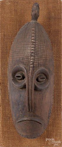 New Guinea carved wood mask, 15 1/2'' h.