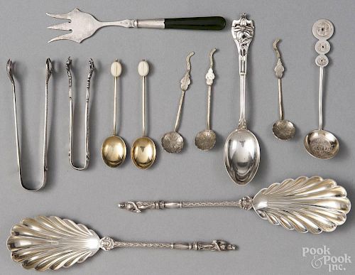Group of decorative silver flatware and serving utensils, various makers and grades, 7 ozt.