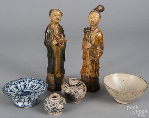 Two Chinese pottery figures, 8 3/4'' h., together with four pieces of early blue and white porcelain.