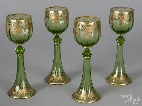 Set of four emerald glass wines with gilt decoration, 7 7/8'' h.