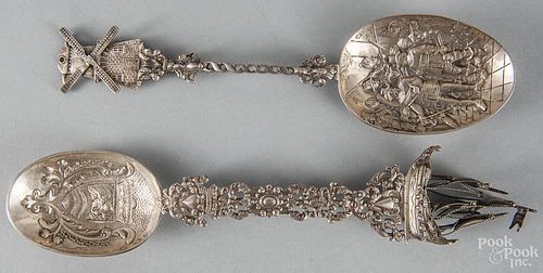 Two elaborate Dutch silver spoons, late 19th c., 9 3/4'' l. and 11 1/4'' l., 7 ozt.