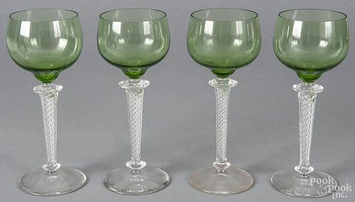 Set of four glass wines with air twist stems, early 20th c., 7 3/8'' h.