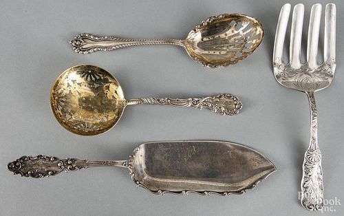 Four sterling silver serving utensils, 12.8 ozt.